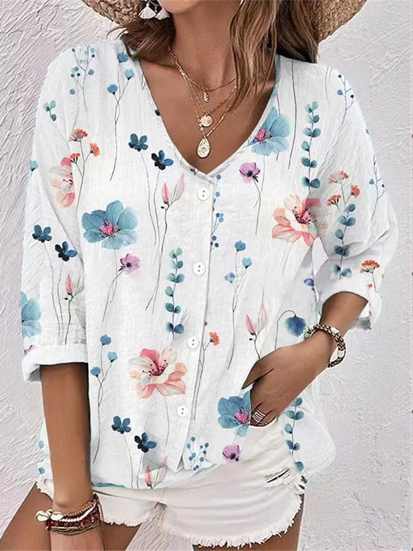 Women's blouse with floral print and modern button design, size