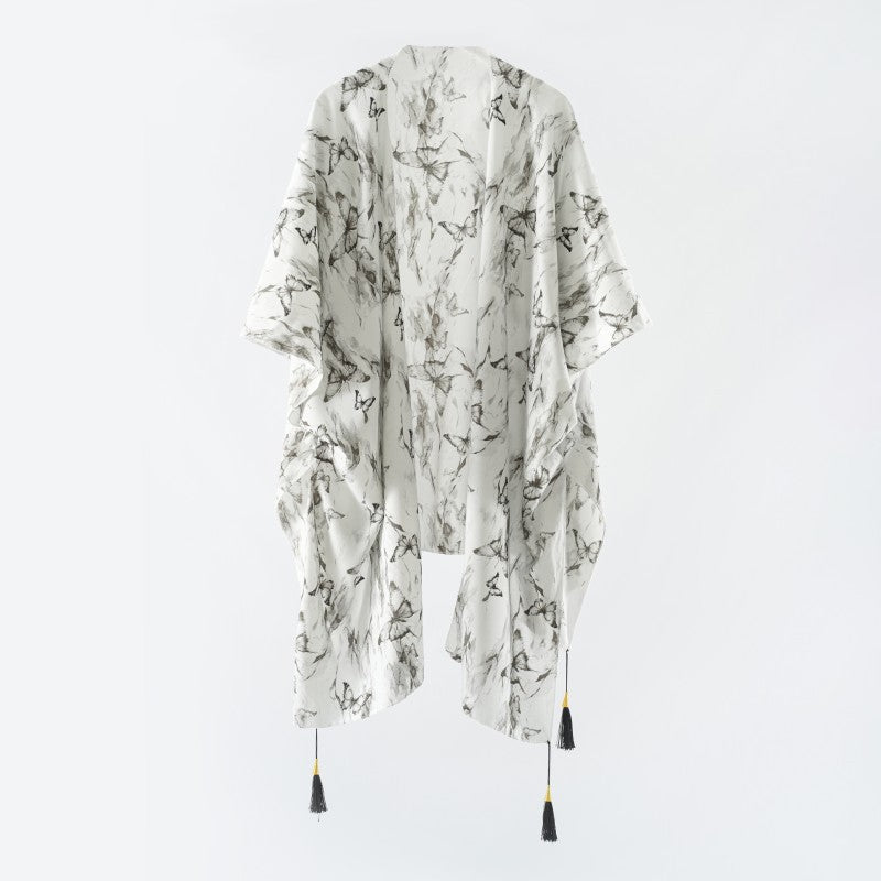 Women's elegant kimono with an artistic floral pattern and fringed edges, size Valenzora