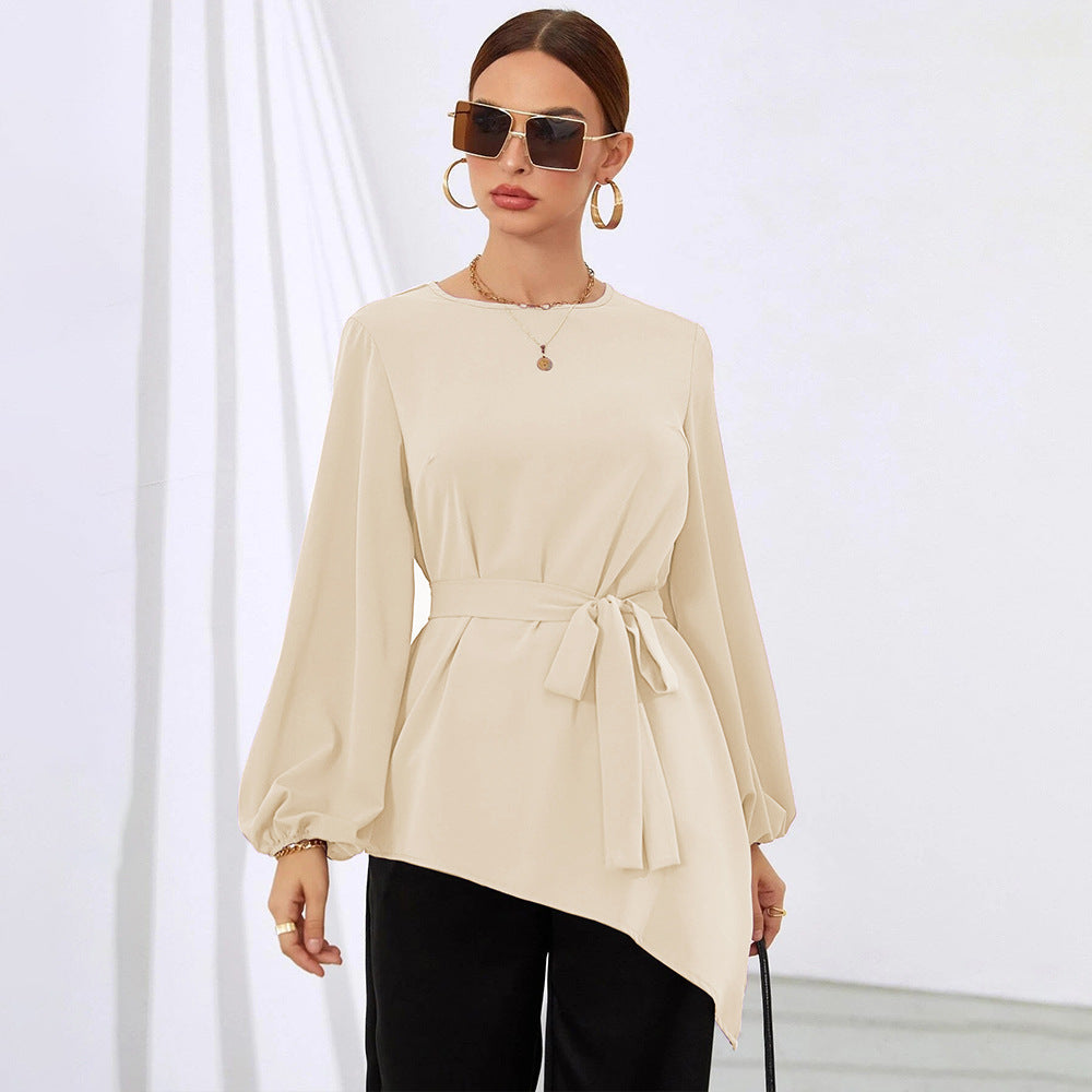 Women's asymmetrical blouse top with elegant ruffles and fashionable waist belt, size S