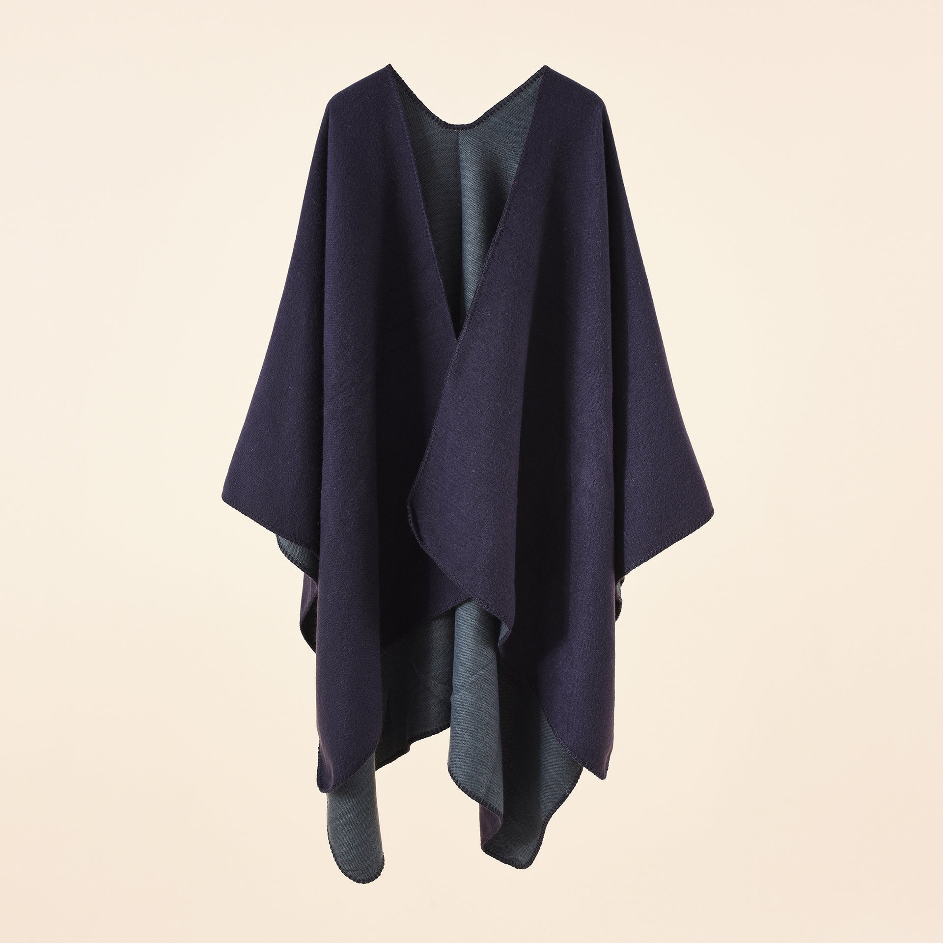 Women's knitted poncho with asymmetrical cut and high warmth retention, size