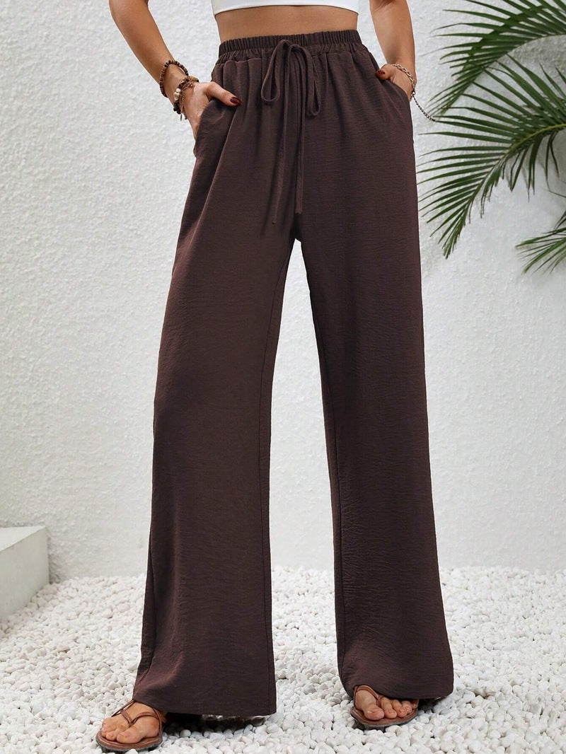 Women's casual, wide-legged leisure trousers with elasticated waistband and side pockets, size S