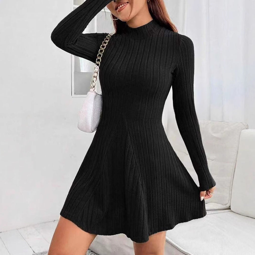 Women's knitted dress with a structured design and long sleeves, size