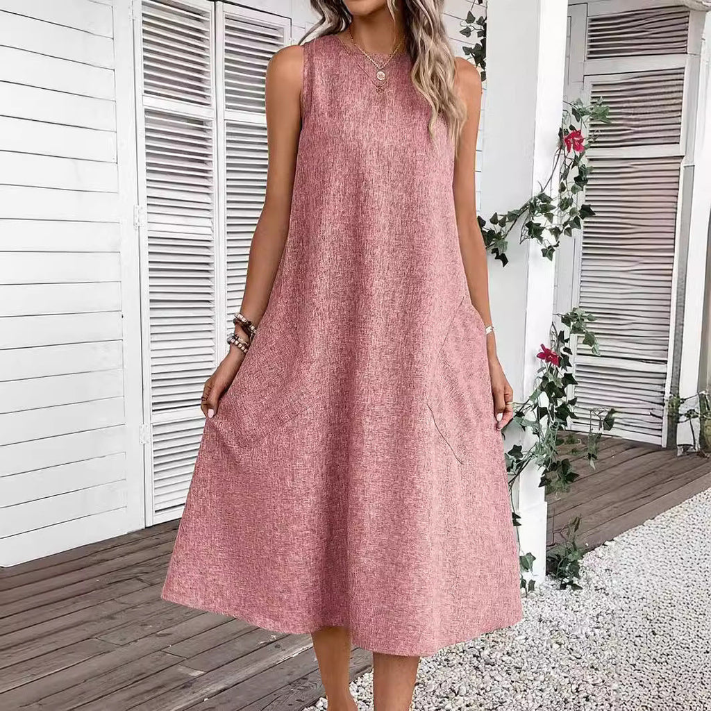 Women's casual midi dress with a deep neckline and practical pockets, size S