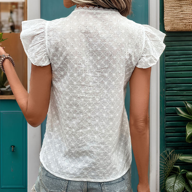 Women's blouse with ruffle details and decorative eyelet embroidery, size
