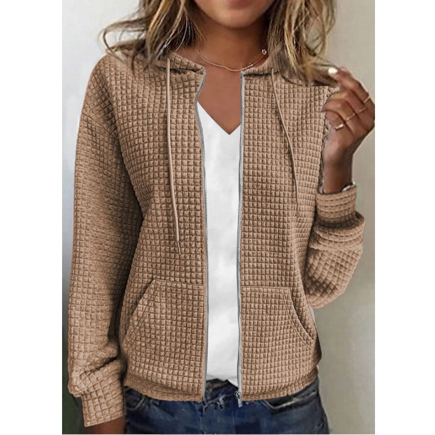 Women's waffle-textured hooded jacket with practical pockets and a modern cut, size S