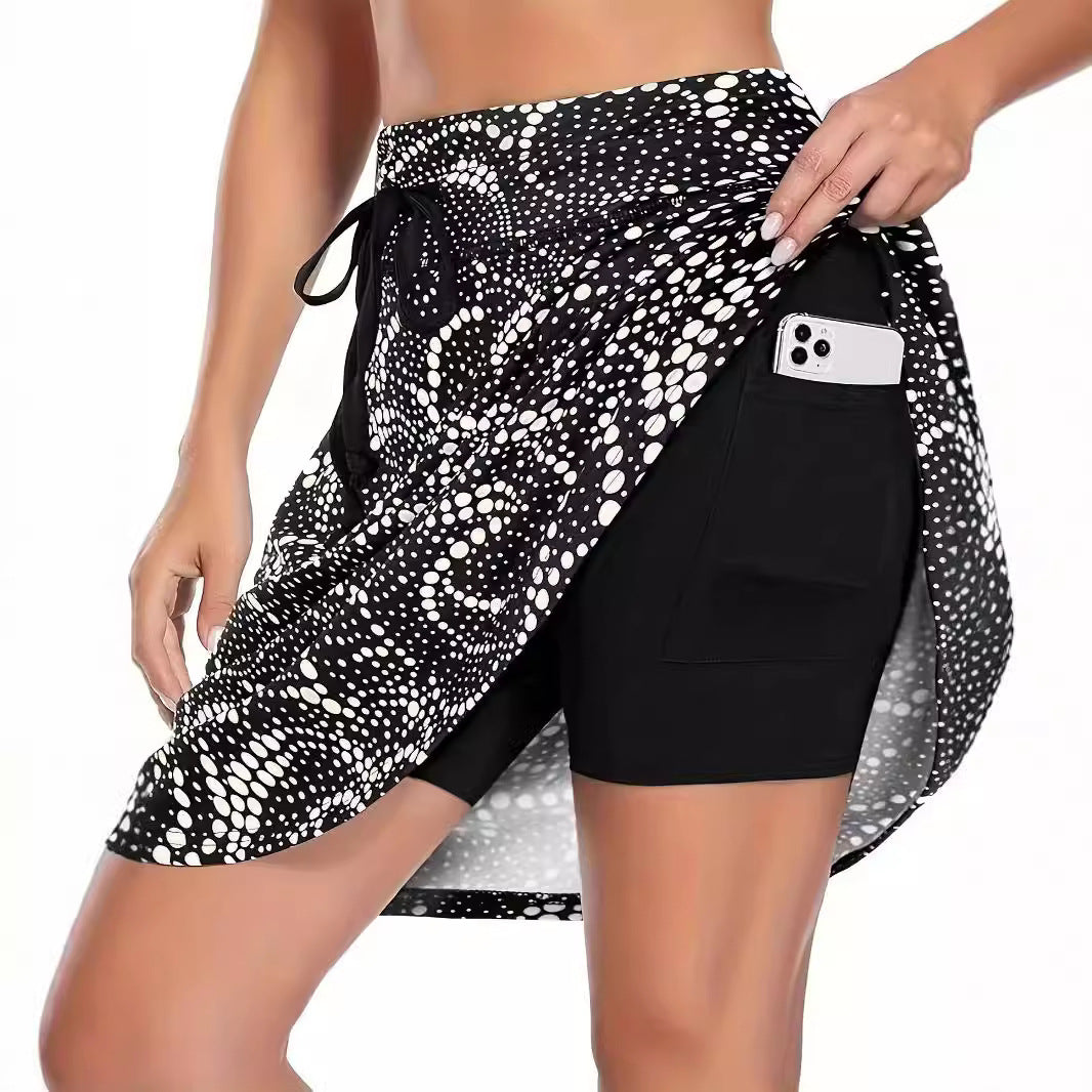 Damen Sportrock mit integrierter Shorts und praktischer Smartphonetasche, Größe