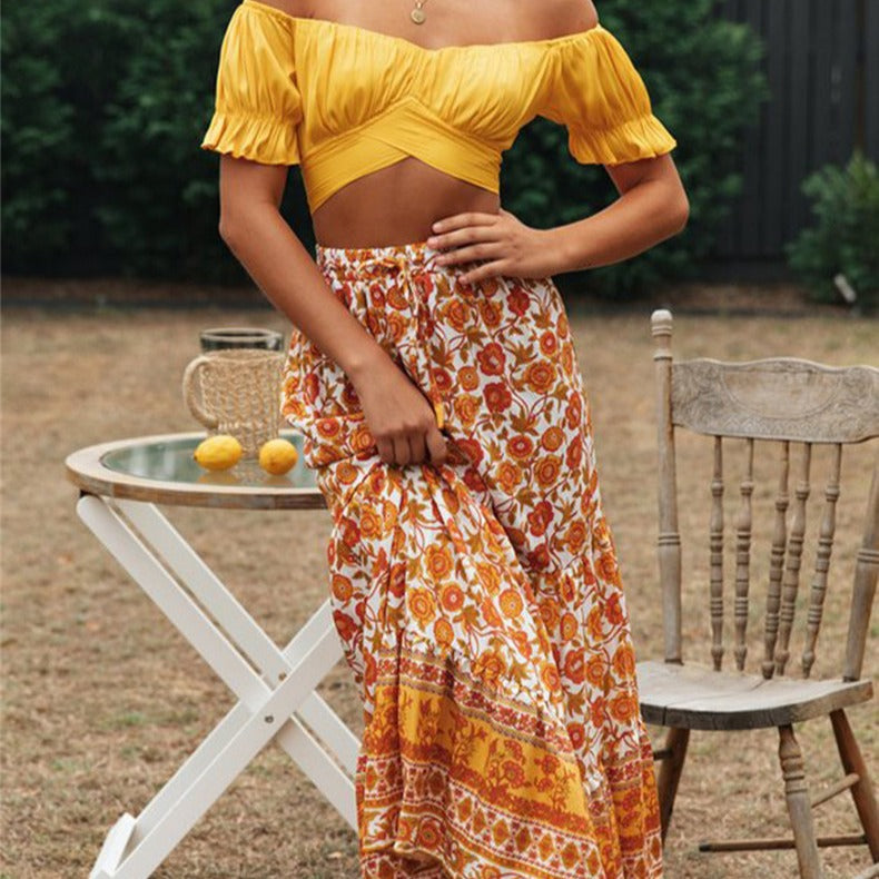 Women's crop top with flowing puff sleeves and knee-length details, size S