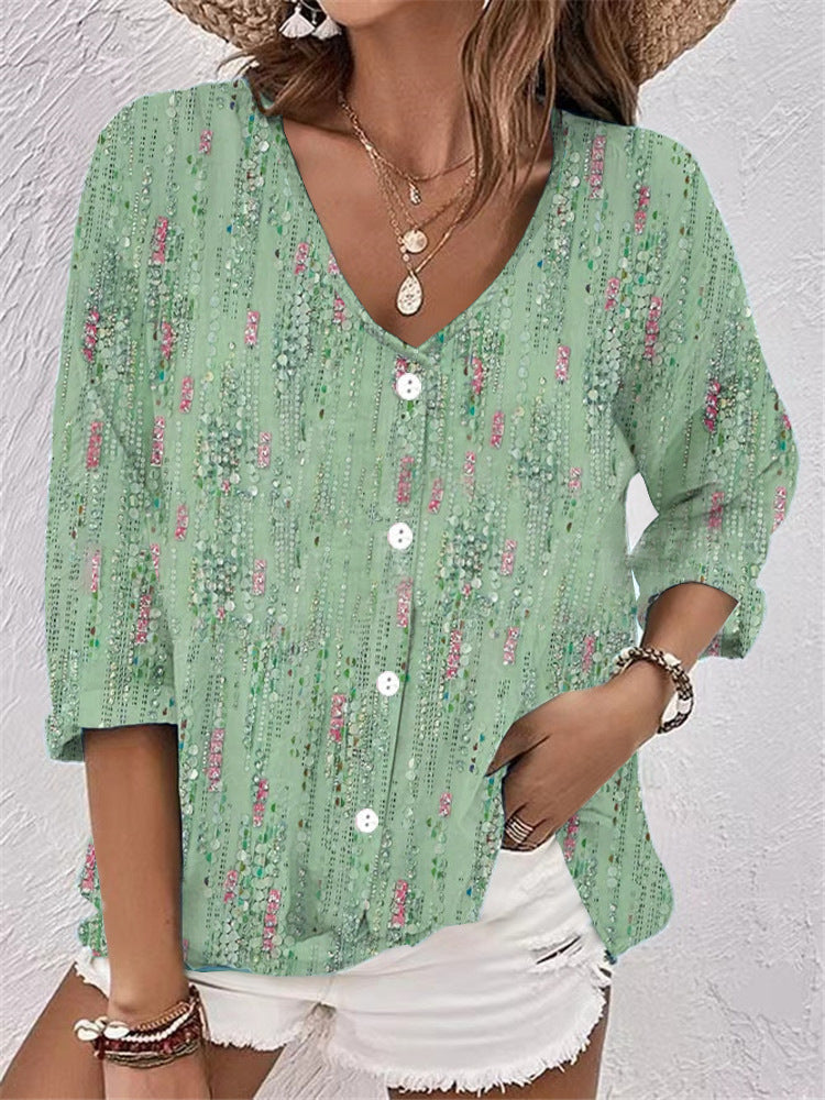 Women's blouse with floral print and modern button design, size