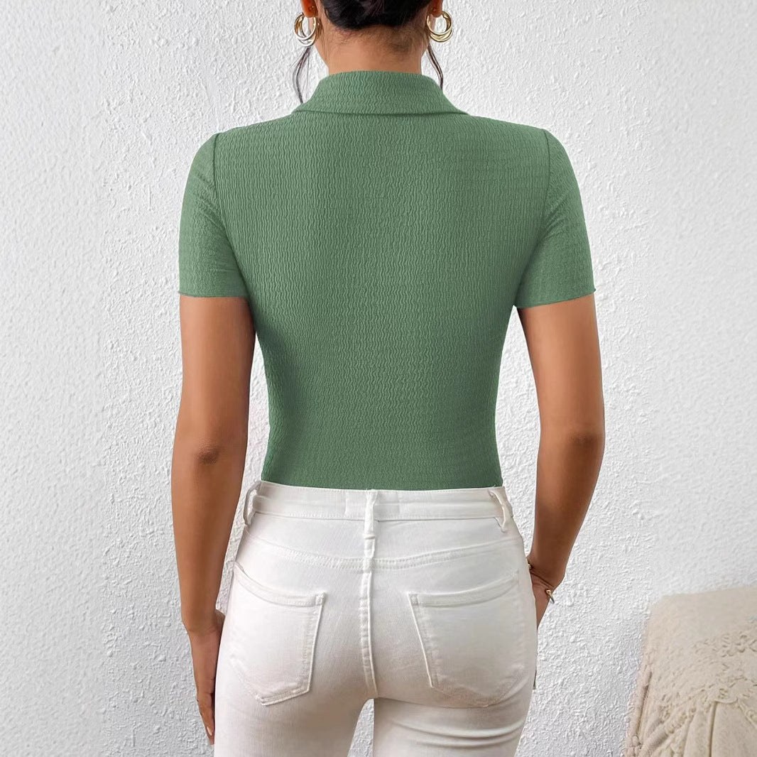 Women's short-sleeved blouse with a structured design and heart-shaped buttons, size [size missing]