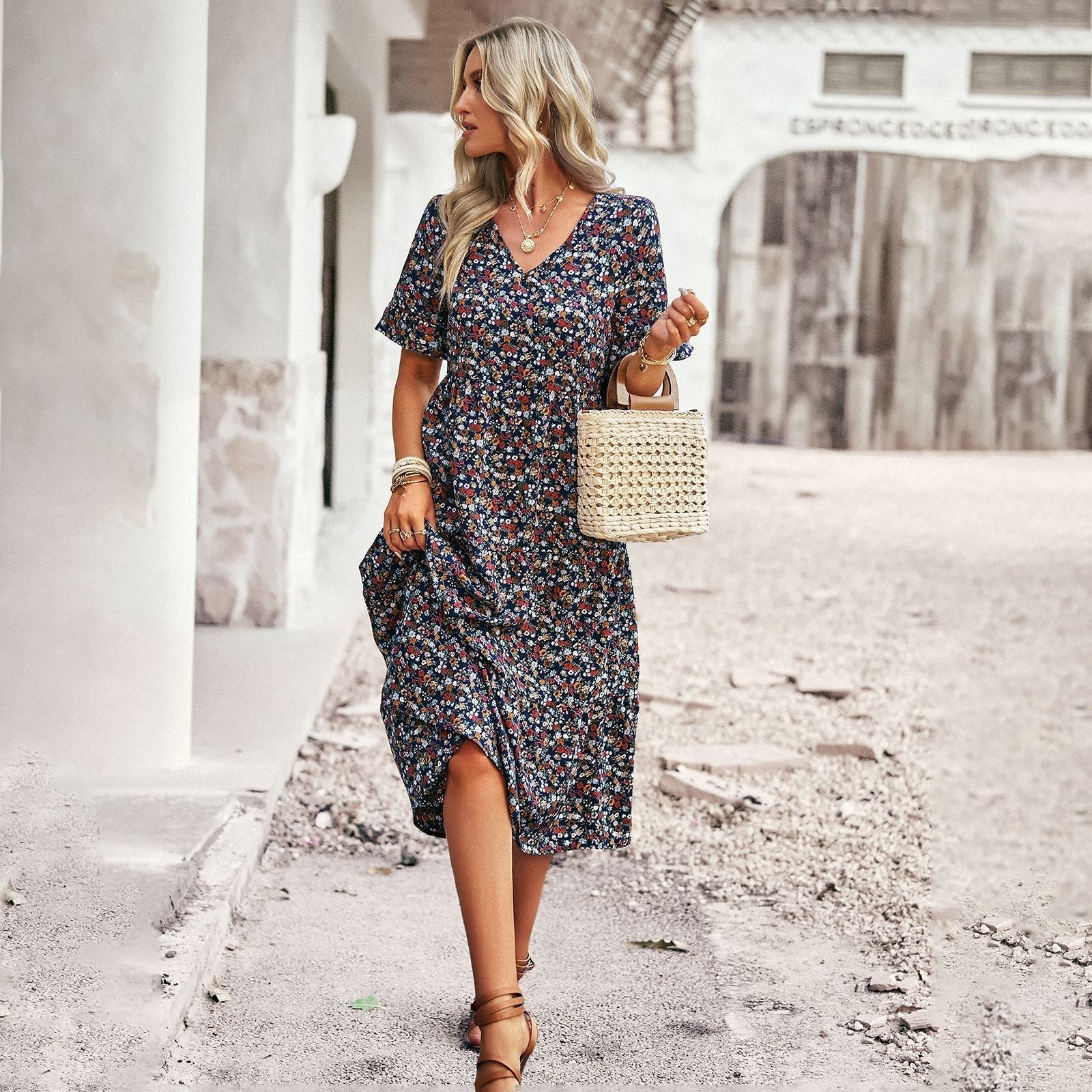 Women's midi dress with floral pattern and playful V-neck, size