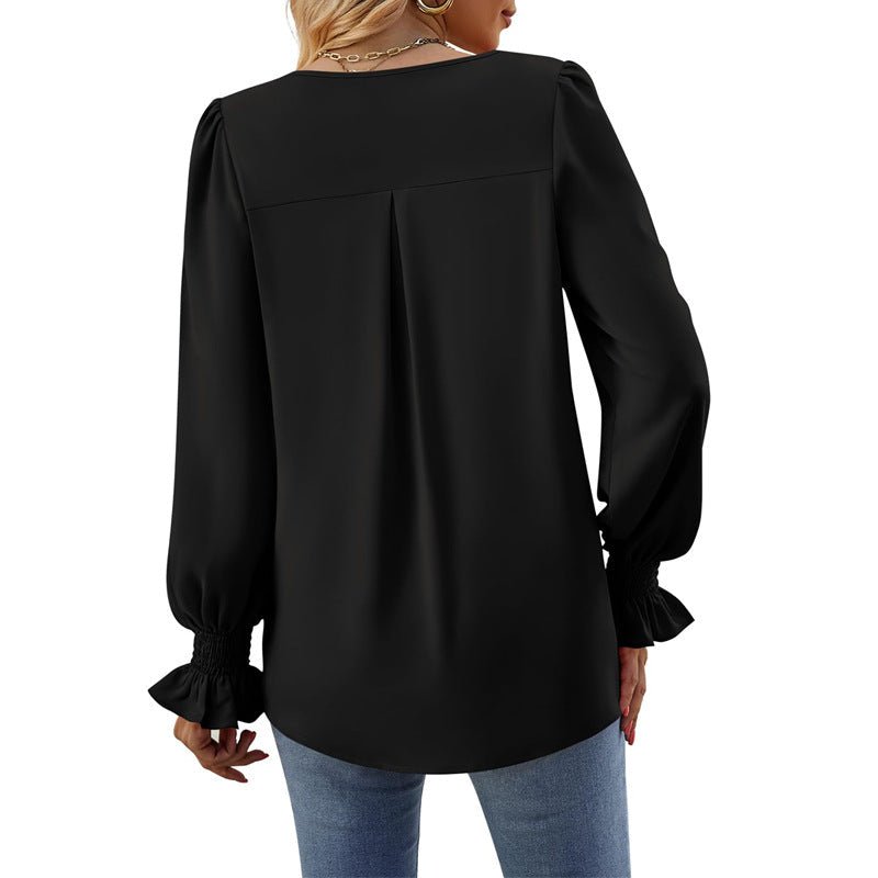 Valenzora | Solid color V-neck top with puff sleeves and long sleeves