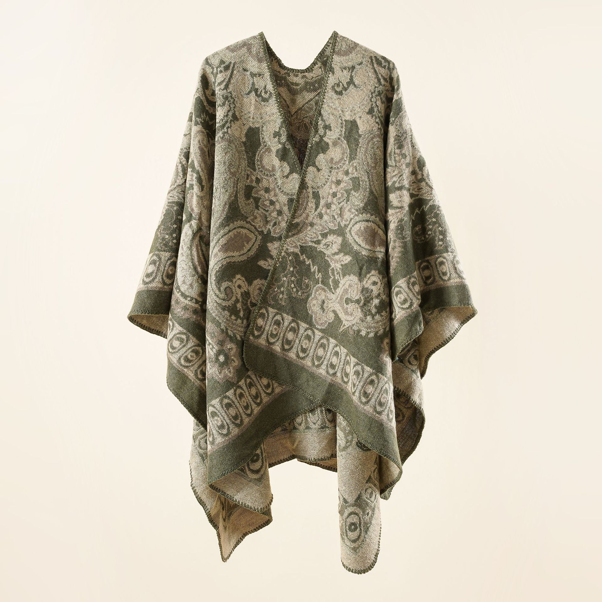 Women's elegant poncho with an artistic floral pattern and luxurious feel (size not specified)