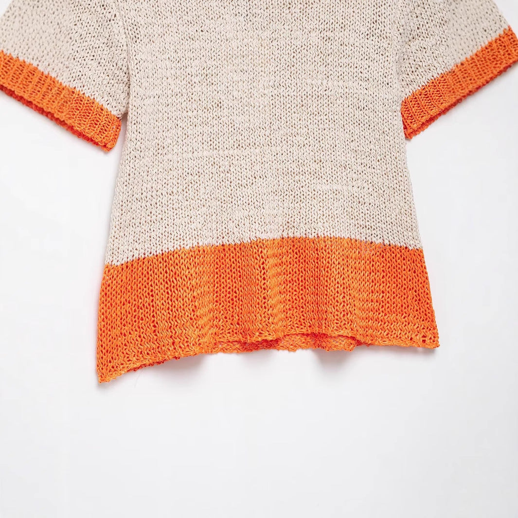 Women's knit top with contrasting color accents and a relaxed fit, size S