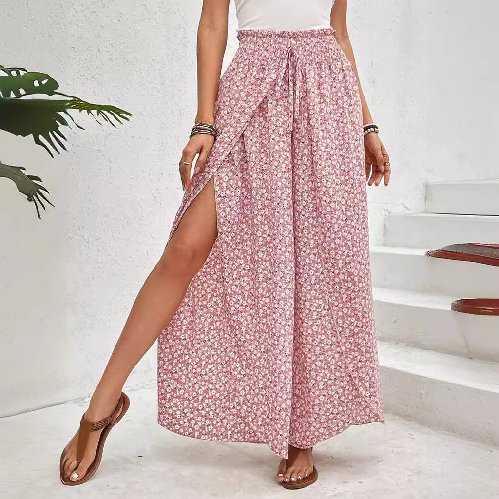 Women's wide-leg summer trousers with elasticated waistband and floral design, size S
