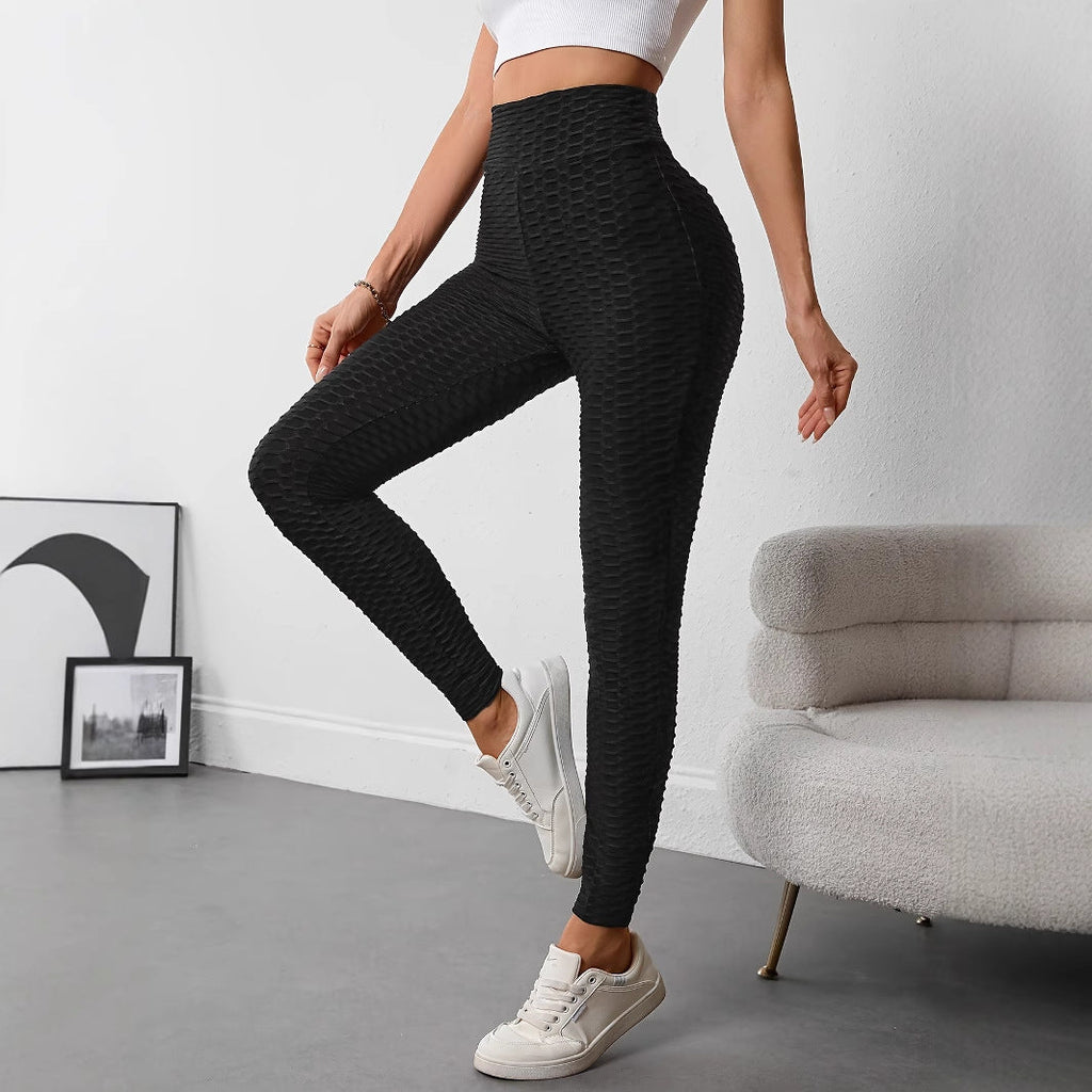 Women's high-waisted sports leggings with a textured surface, size S