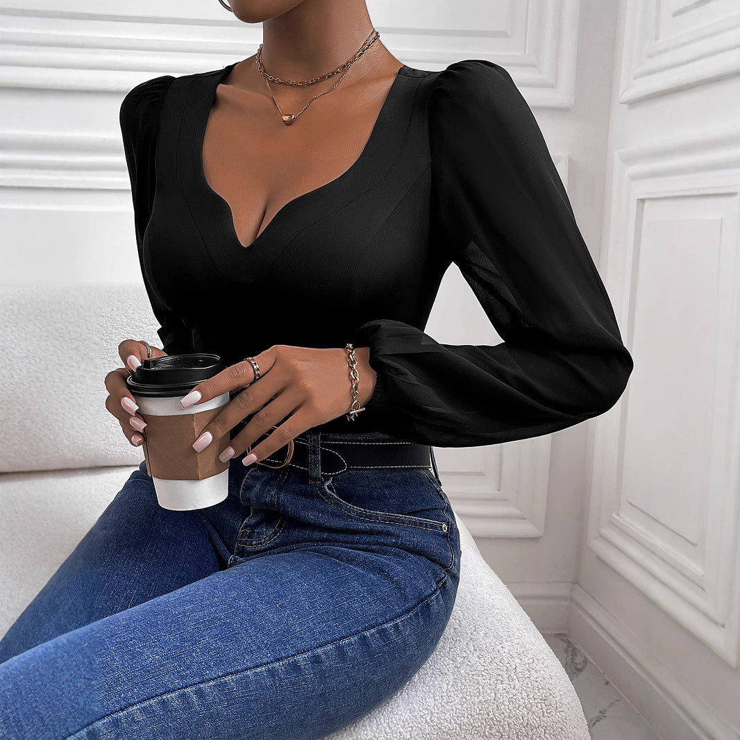 Women's bodysuit with deep V-neck and transparent puff sleeves, size