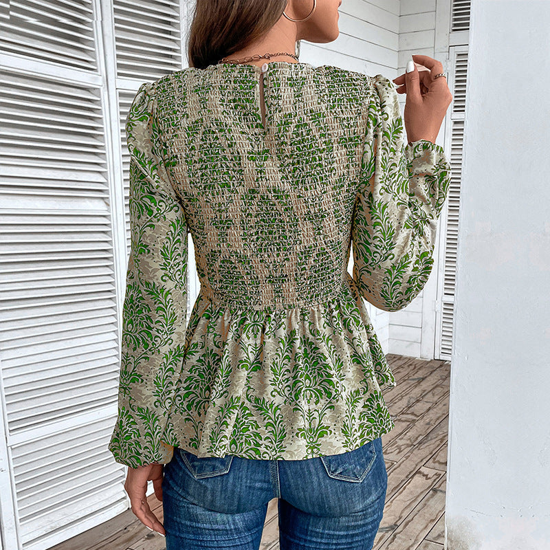 Women's blouse with elegant ruffle seams and floral pattern, size S