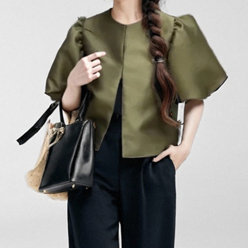 Women's blouse with voluminous puff sleeves and modern design, size S