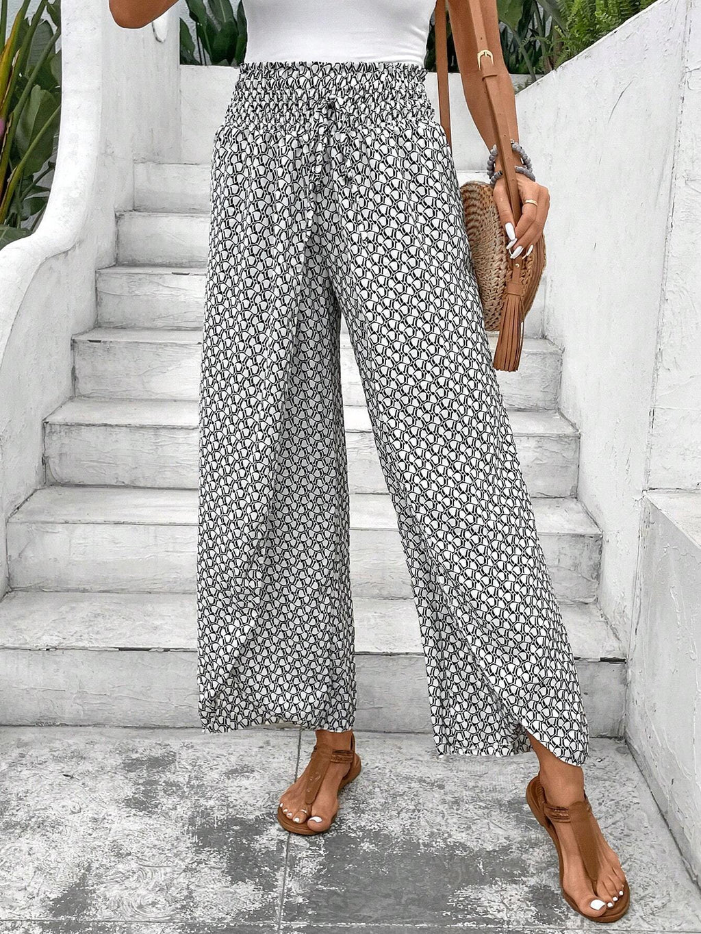 Women's wide-leg summer trousers with elasticated waistband and floral design, size S