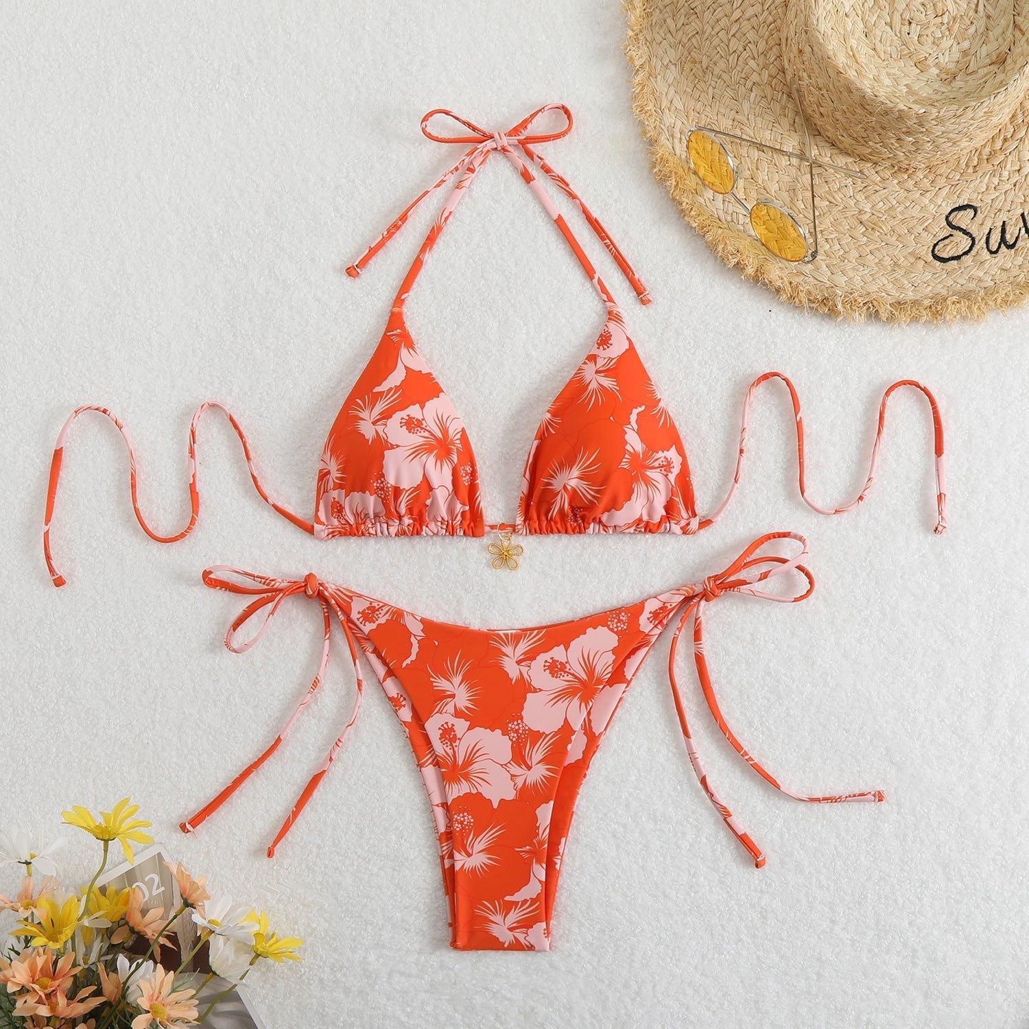 Valenzora | Women's triangle bikini set with playful floral pattern and tie straps