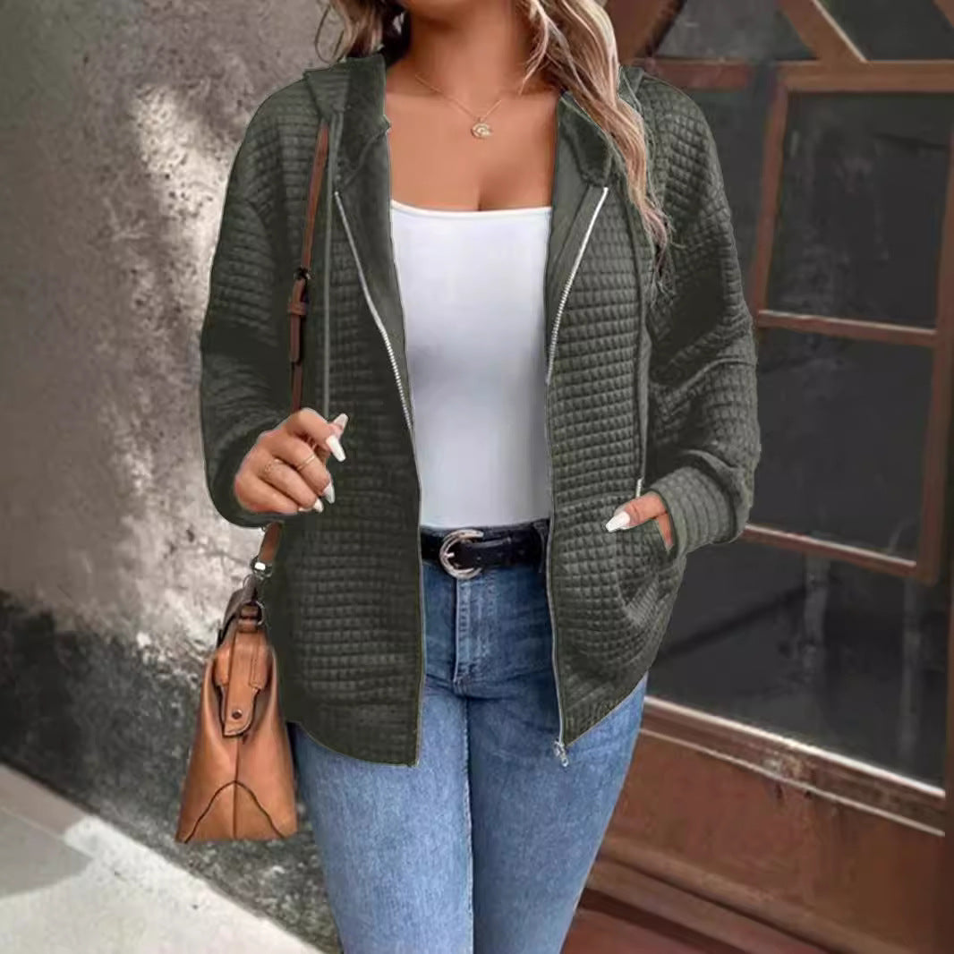 Women's loose-fitting hooded jacket with a textured waffle surface and practical pockets, size S