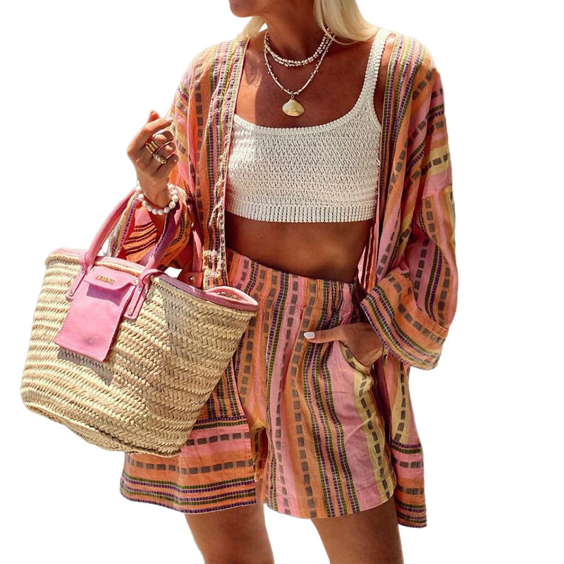 Women's casual top with a relaxed knit look and striped shorts, size S