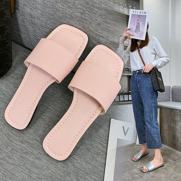 Women's open toe-post mules with an elegant design, size S