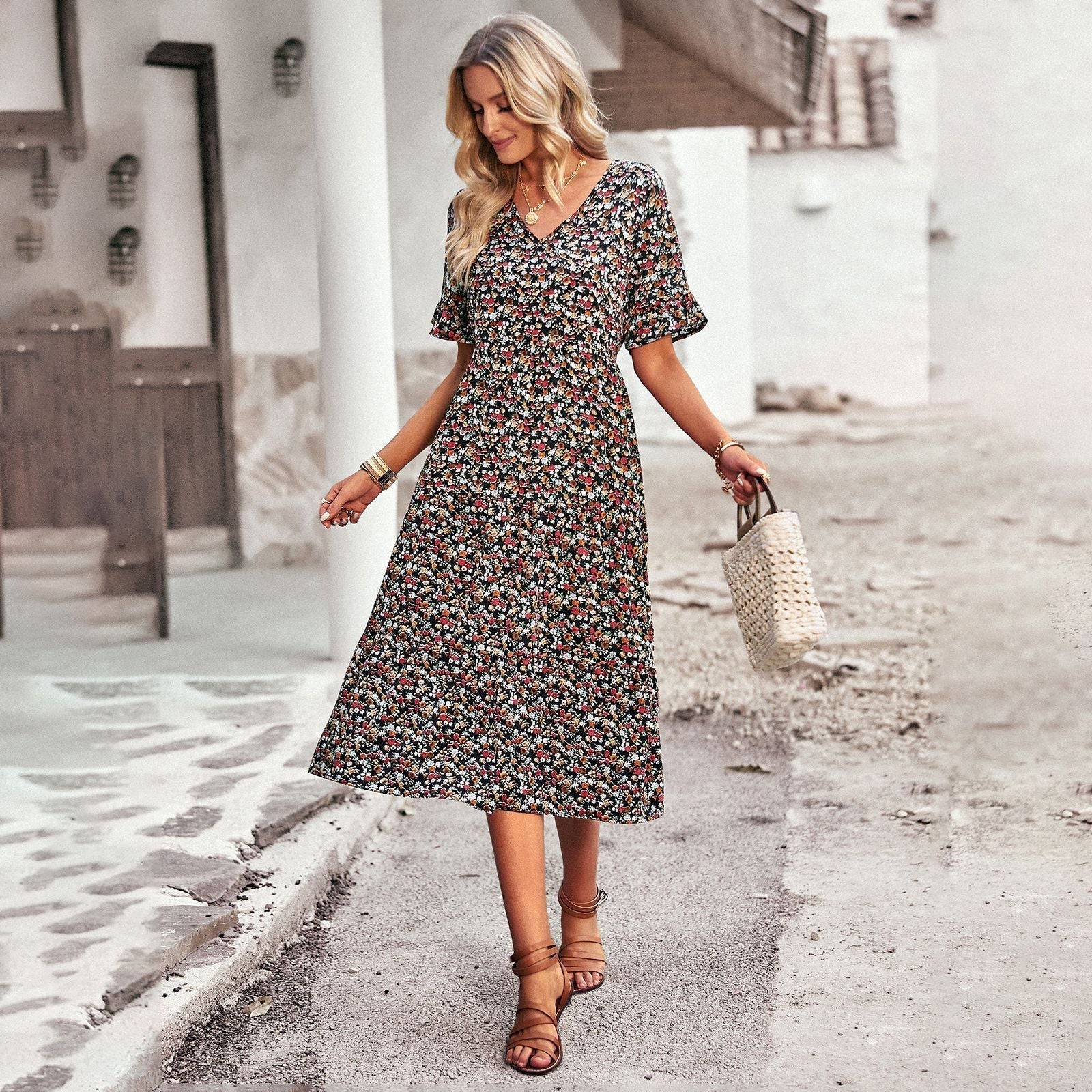 Women's midi dress with floral pattern and playful V-neck, size