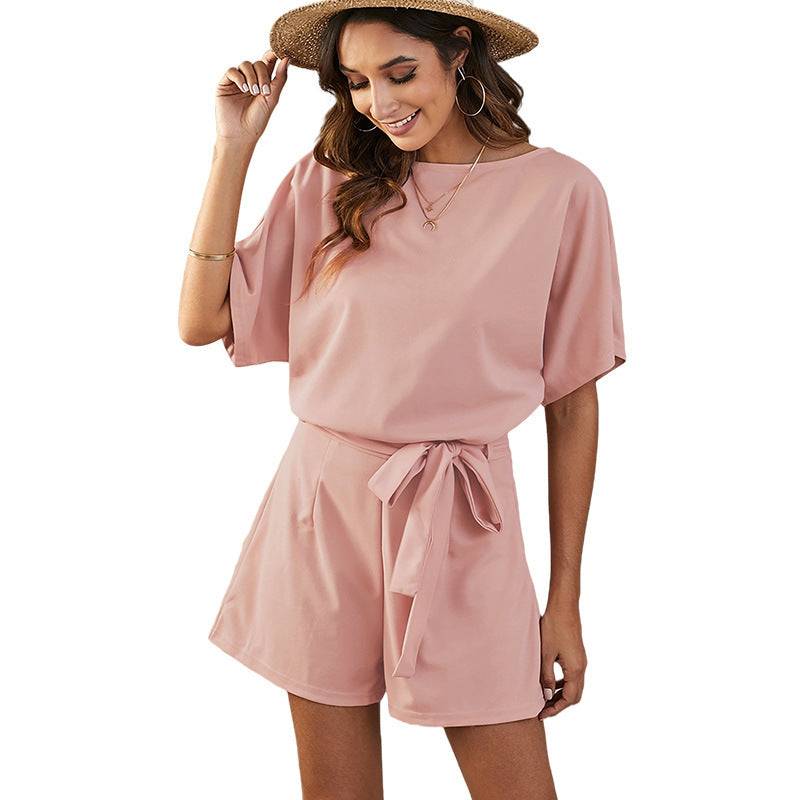 Women's one-piece jumpsuit with a relaxed fit and tie belt, size [size missing]