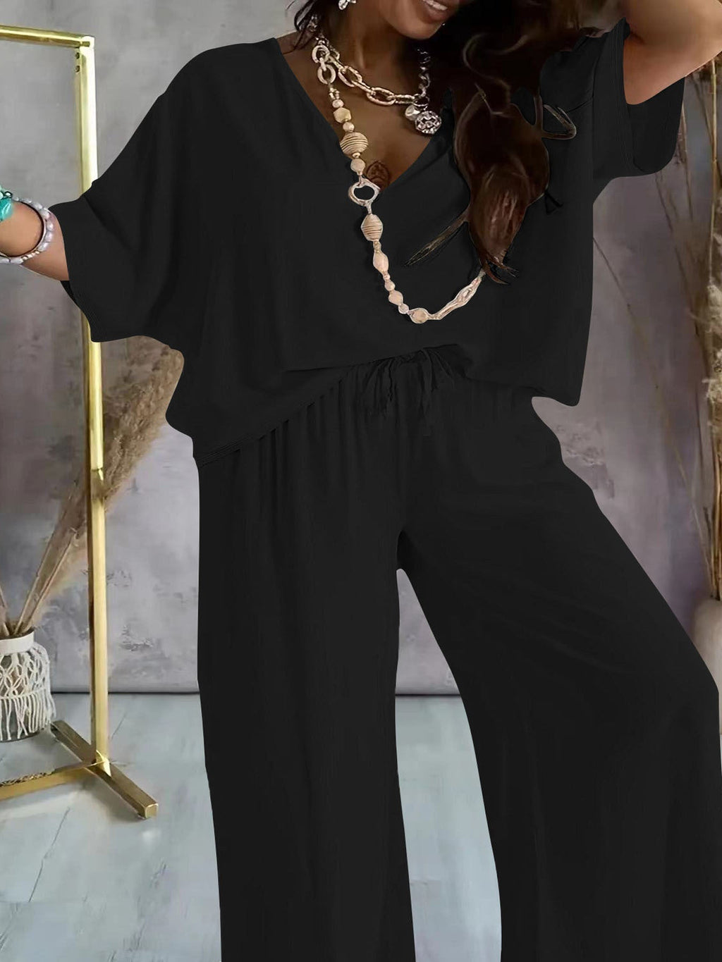 Eleganter Damen-Jumpsuit mit V-Ausschnitt und weitem Bein, Größe