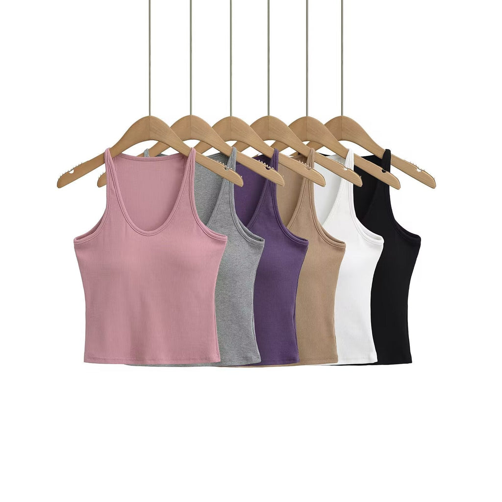 Women's sleeveless sports top with deep U-neck and elastic material, size S