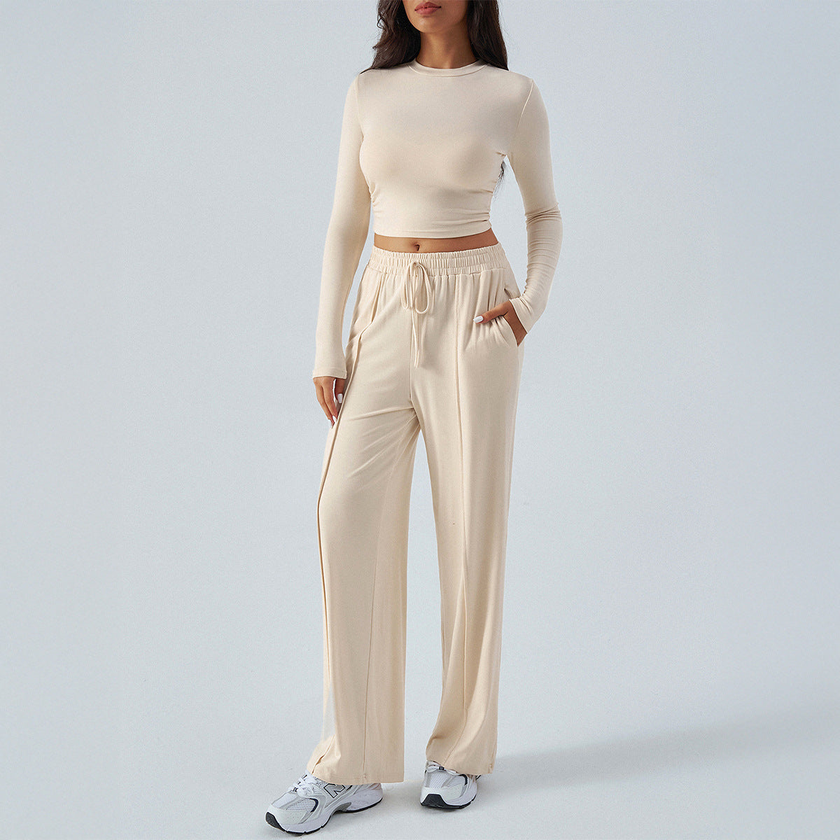 Women's casual two-piece set with a loose-fitting top and elasticated trousers, size
