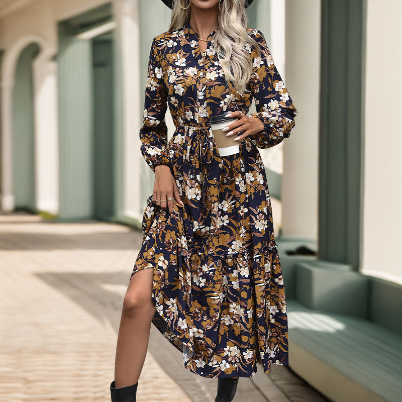 Women's midi dress with floral design and elegant waistline, size S