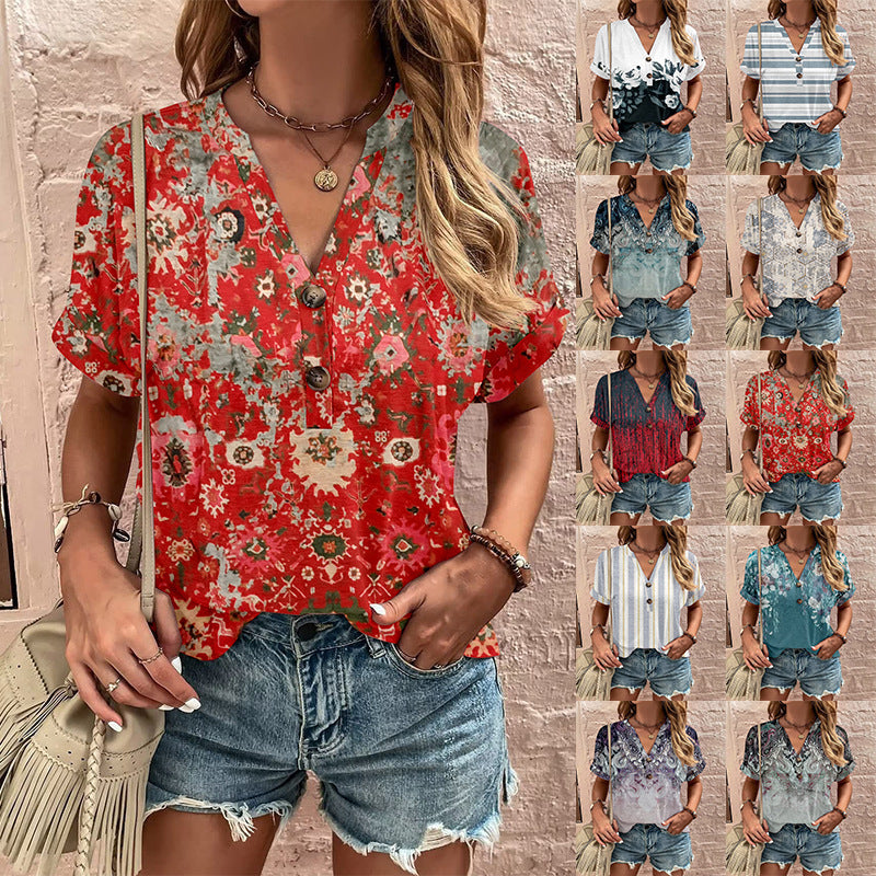 Women's casual short-sleeved blouse with a playful paisley pattern and modern button details, size S