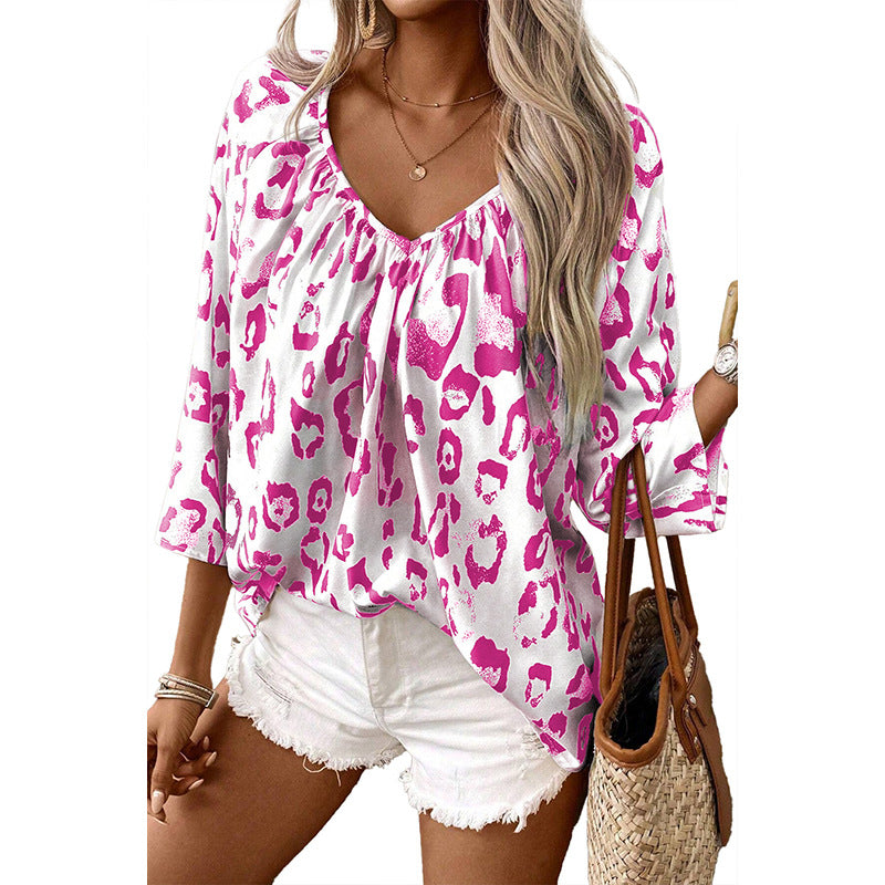 Women's blouse top with a relaxed fit and chic leopard print, size S