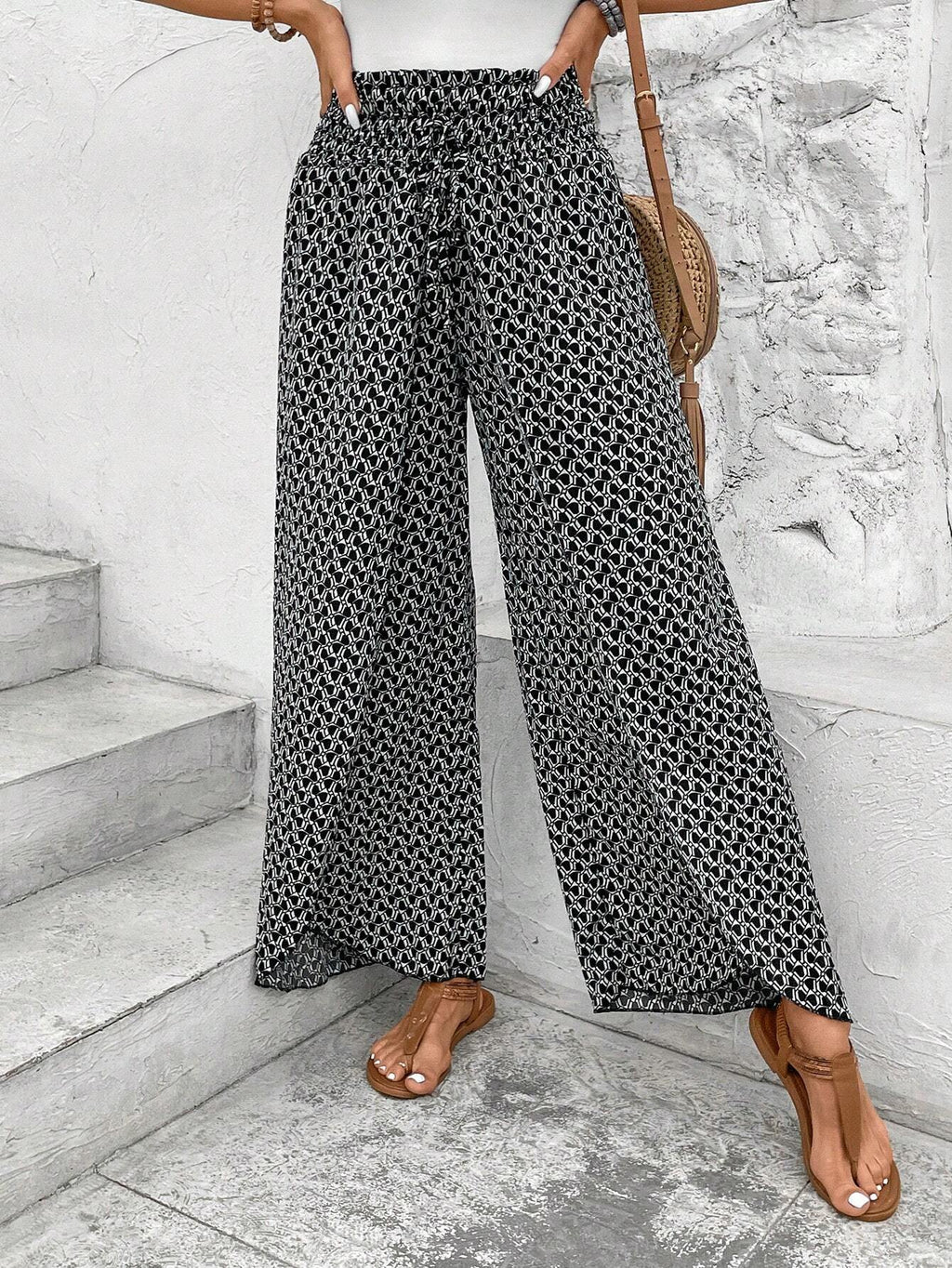 Women's wide-leg summer trousers with elasticated waistband and floral design, size S