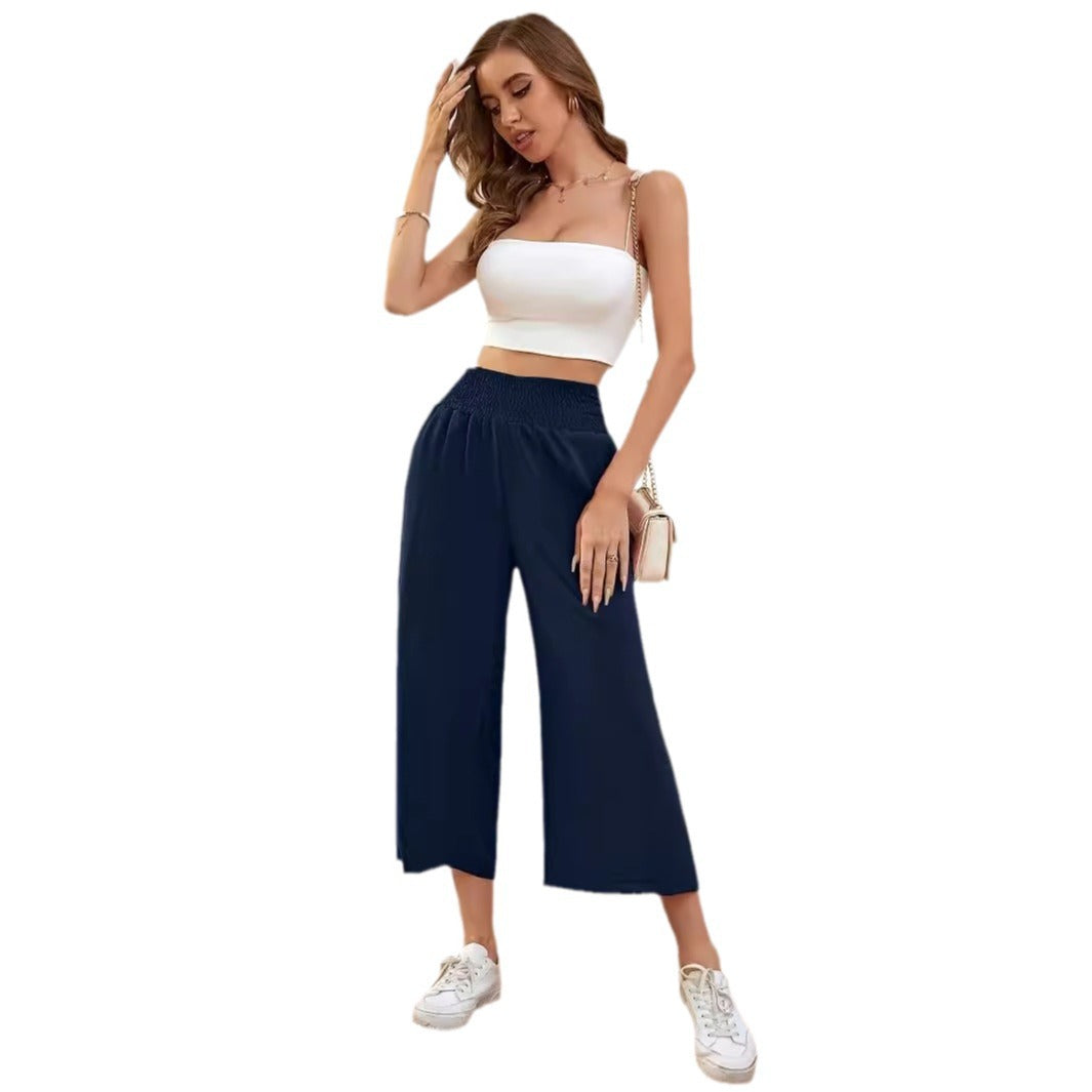 Women's wide-leg, high-waisted palazzo pants with elasticated waistband and flowing material, size S