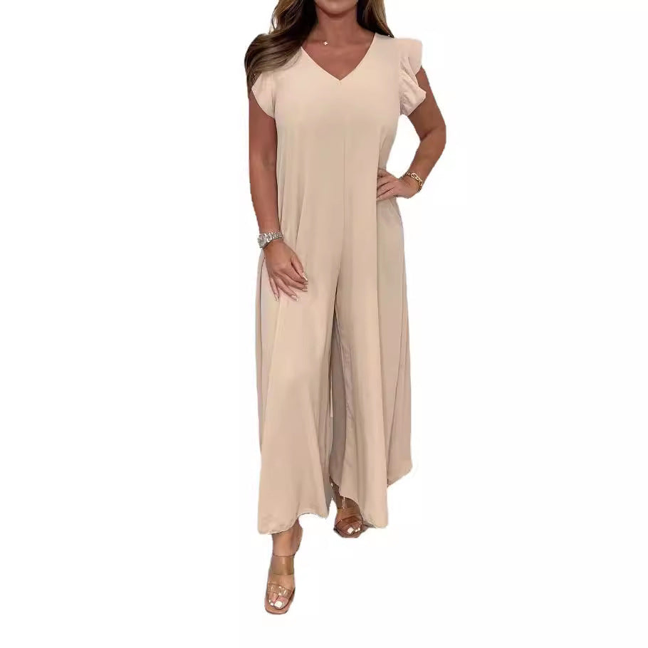 Women's upscale jumpsuit with voluminous ruffled sleeves and V-neck, size S