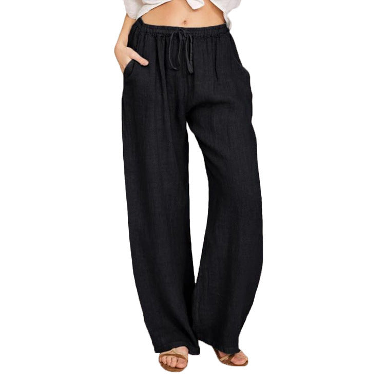 Women's wide linen trousers with elasticated waistband and practical pockets, size