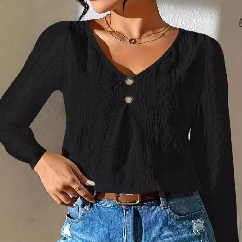 Women's blouse with decorative buttons and textured fabric, size S