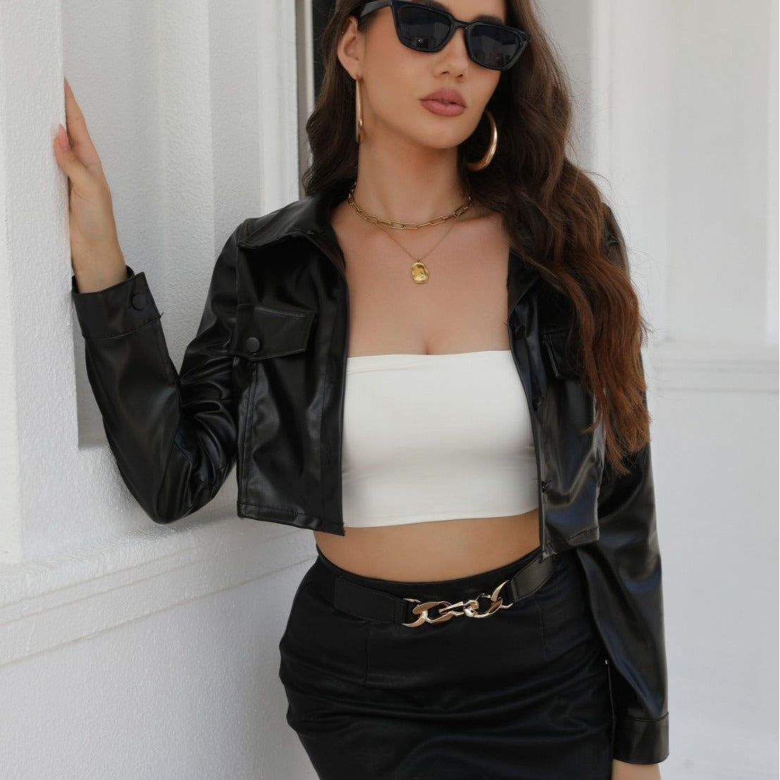 Women's cropped faux leather jacket with classic collar and fashionable cut, size S