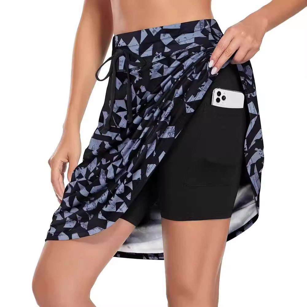 Damen Sportrock mit integrierter Shorts und praktischer Smartphonetasche, Größe