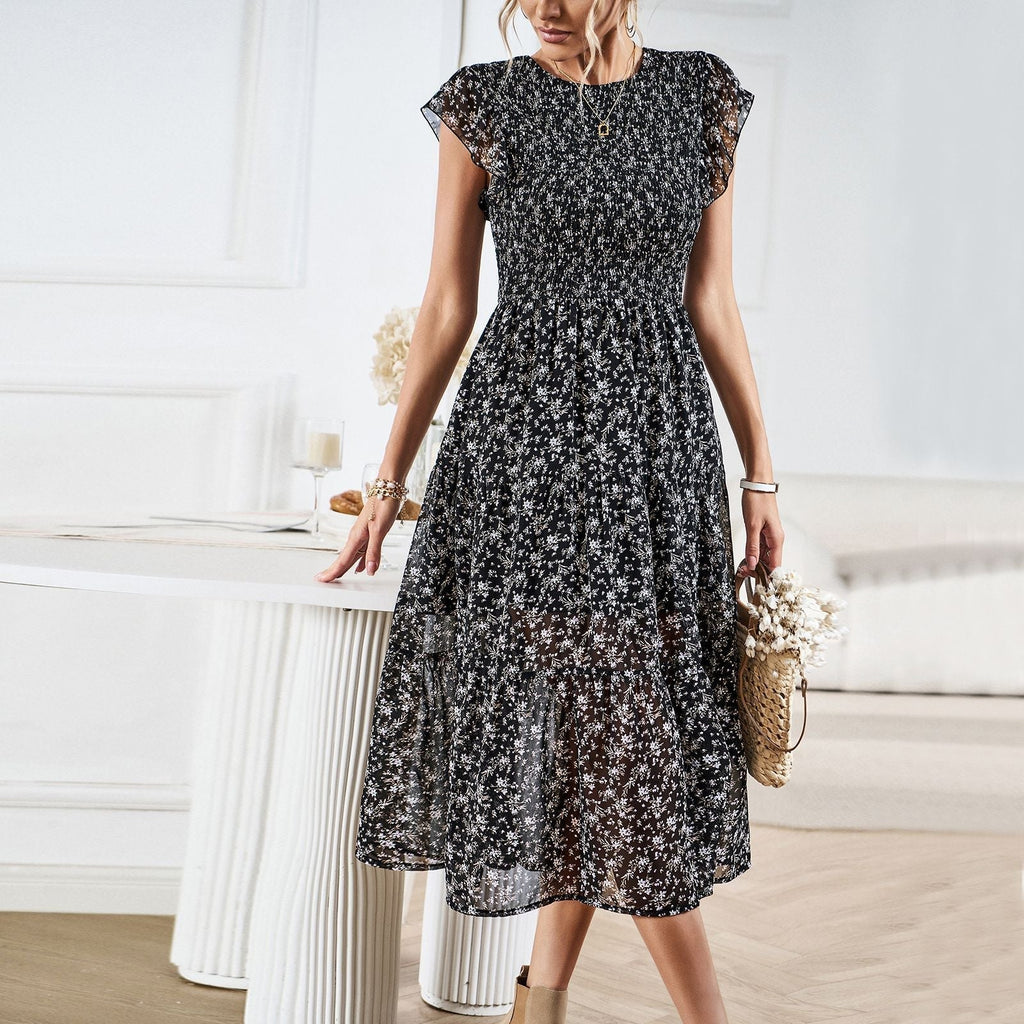 Women's midi dress with floral design and flattering ruffled hem, size [size missing]
