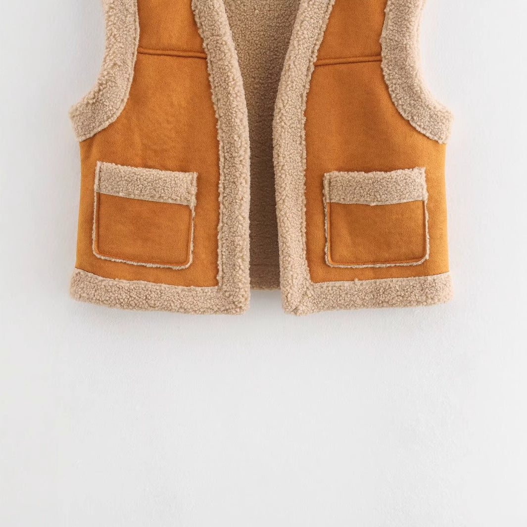 Women's teddy vest with practical pockets and high collar, size