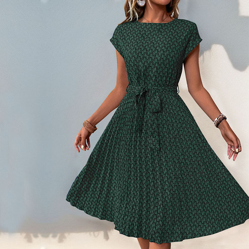 Women's midi dress with a sophisticated waist belt and playful pattern, size