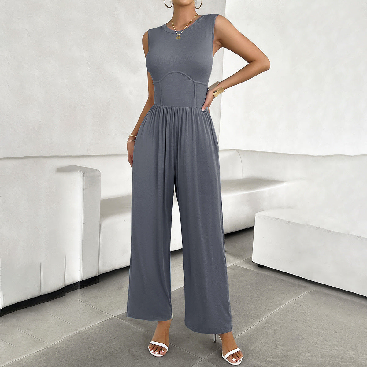 Women's elegant jumpsuit with a wide cut and figure-flattering design, size S