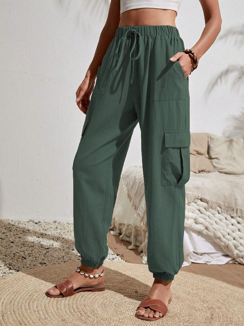 Women's cargo trousers with elasticated waistband and practical side pockets, size S
