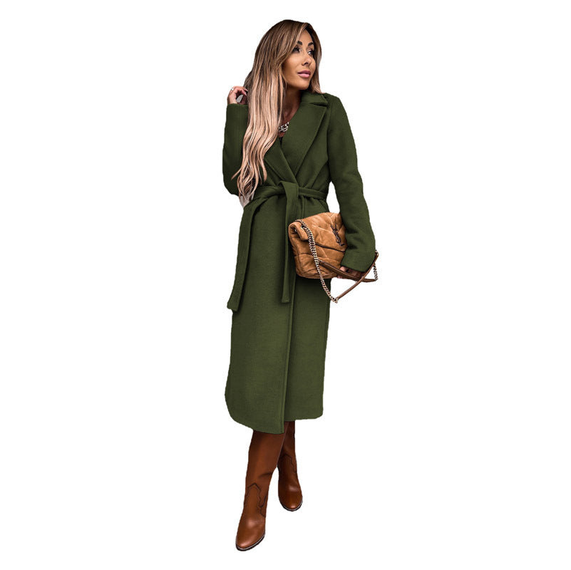 Women's elegant trench coat with tie belt and textured material, size S