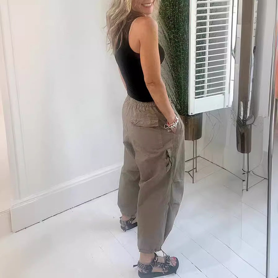 Women's casual pleated trousers made of breathable material, size S