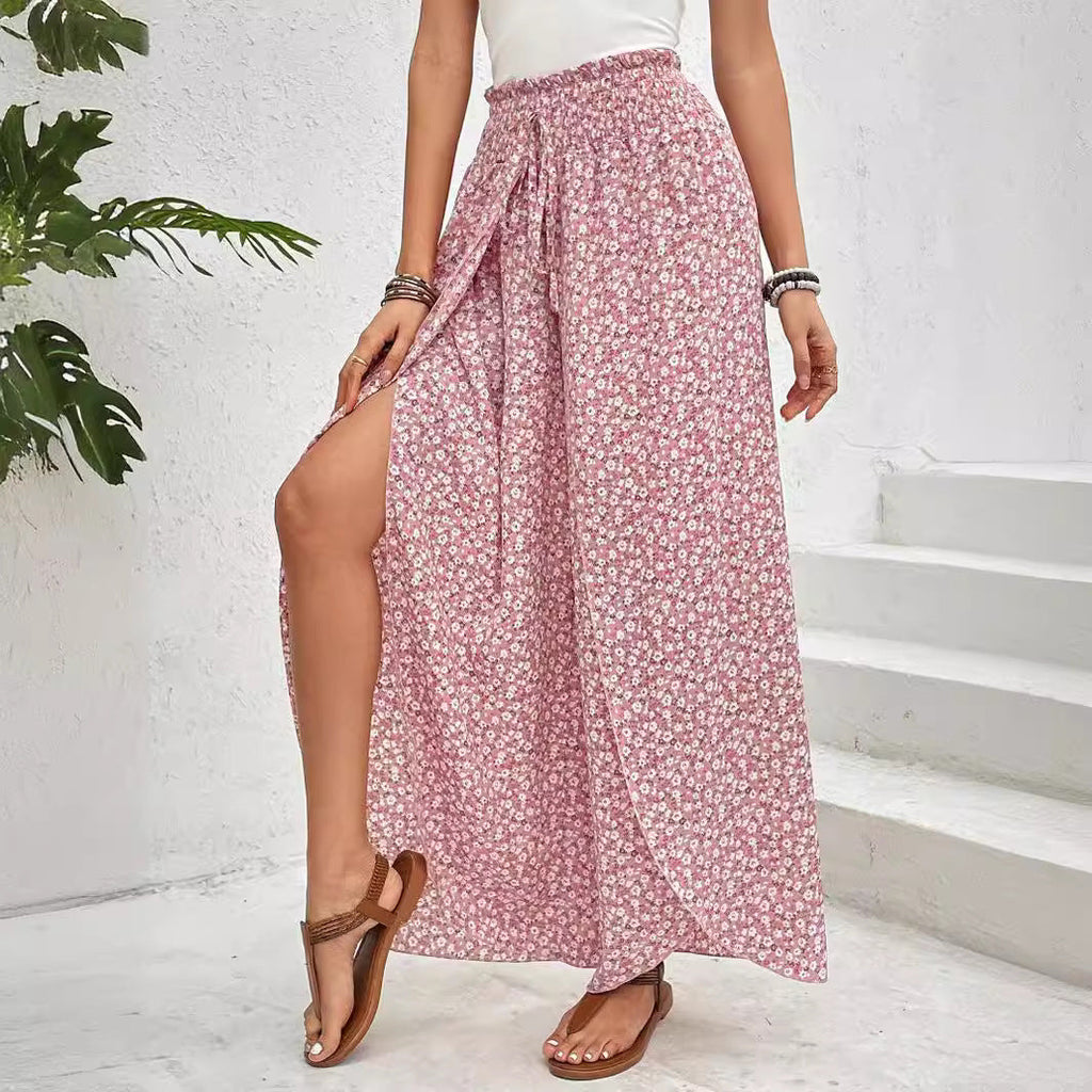 Women's wide-leg summer trousers with elasticated waistband and floral design, size S